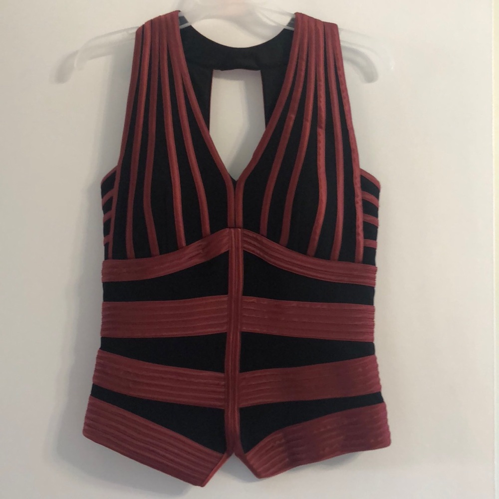Size 8 sleeveless top. Great for Holiday Parties. Black and Rust